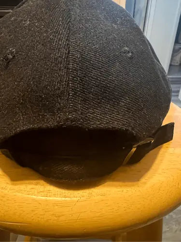 Vintage Dale Earnhardt 7 Time Champion Hat featuring a black textured fabric baseball cap with strap adjuster