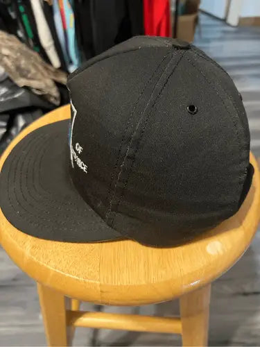 Vintage FreePort Sulphur snapback hat featuring a black baseball cap with a flat brim