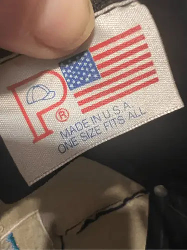 Clothing tag with American flag and MADE IN U.S.A. text on Vintage Freeport Sulphur SnapBack Hat
