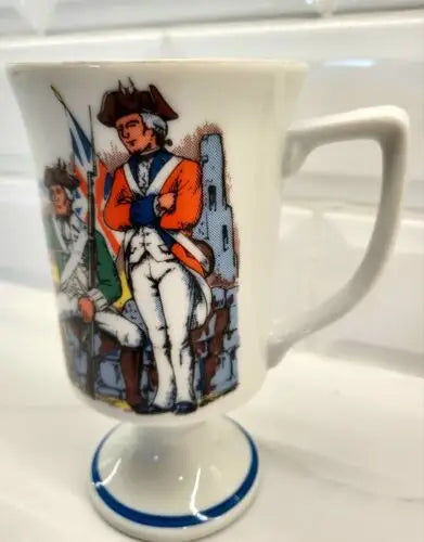 Footed mug featuring Red Coats Revolutionary War figures for tea or coffee enjoyment