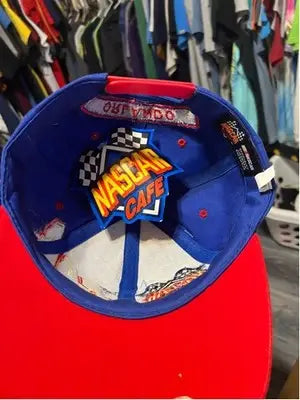 Vintage Nascar Cafe Orlando snapback hat featuring a blue crown and red brim