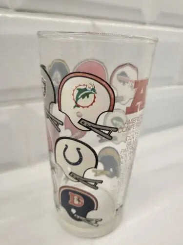 Glass featuring NFL American Football Conference Eastern Division helmet logos