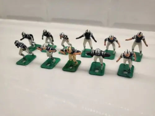 Vintage Baltimore Colts electronic football figurines set featuring blue uniforms
