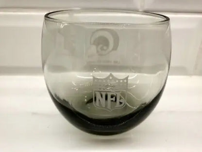 Gray glass tumbler featuring NFL and Los Angeles Rams logos for whiskey lovers