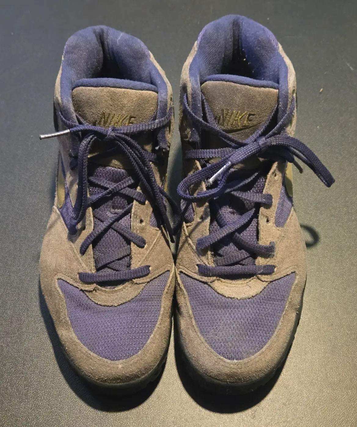 Vintage Nike ACG hiking boots in blue and gray conditions gear for men