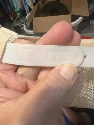 White plastic clothing tag with GEM HOUR text on Vintage Ontario Retro Trucker SnapBack Hat