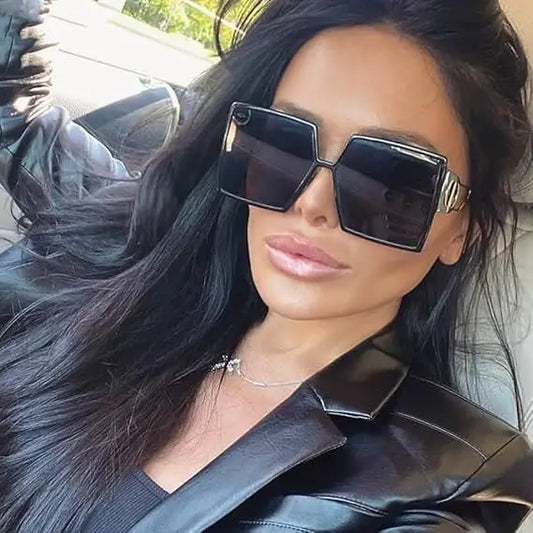 Vintage Oversize Sweetie Sunglasses with black oversized square frames and polarized lenses