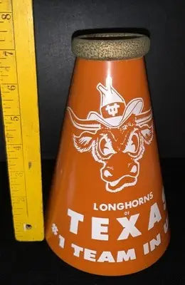 Orange megaphone with cartoon Texas Longhorns national champion wearing cowboy hat