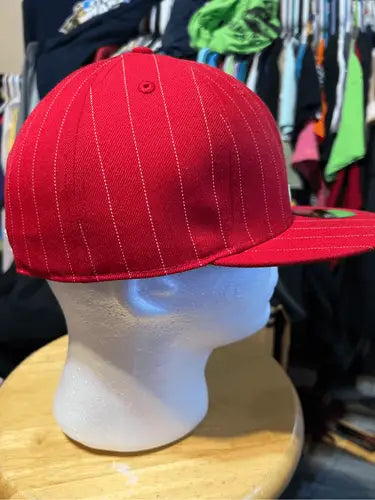 Red pinstriped baseball cap on a white mannequin head, Vintage Saint Louis Cardinals fitted hat
