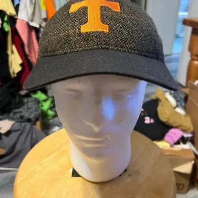 Dark gray baseball cap with orange T logo for Tennessee Volunteers fans