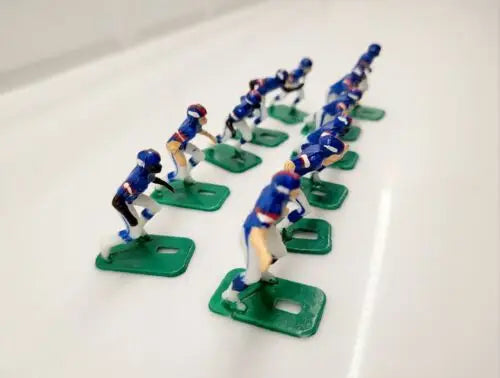 Vintage Tudor electronic football Toy Players on green bases featuring York Giants uniforms