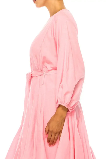 Pink long-sleeved midi dress with tied waist from Vivid Apparel perfect for daytime wear
