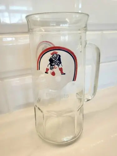 Glass beer mug featuring England Patriots logo on a Fisher beer stein