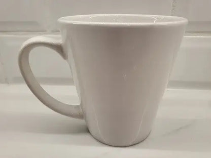 White ceramic coffee mug featuring NY Jets logo in green ceramic design