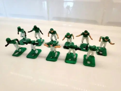 Green and white plastic football figurines for York Jets Electronic Football game