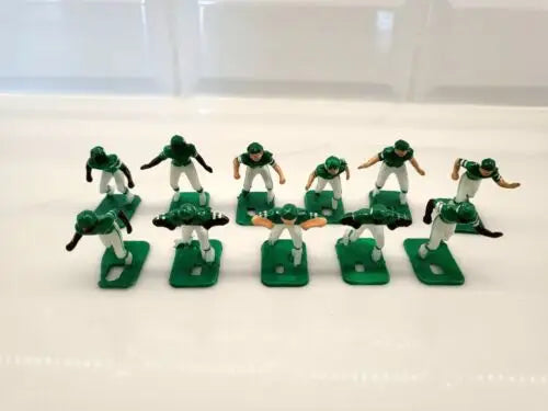 Green plastic figures from Vtg Tudor New York Jets Electronic Football set