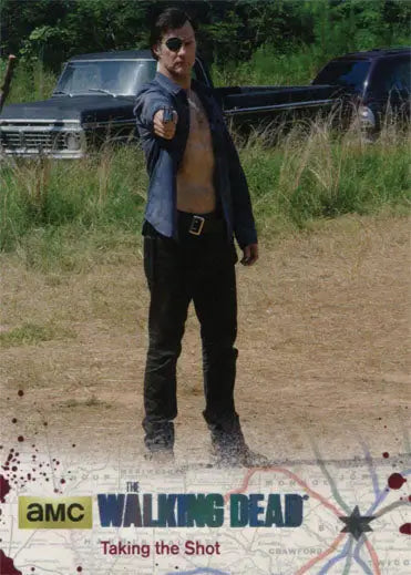 Person in police uniform with badge on dirt path featured in Walking Dead Silver Parallel trading card