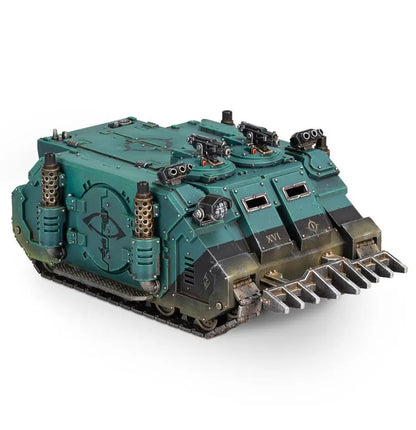 Teal-colored Legiones Astartes armored tank model with twin-linked heavy bolters and ram