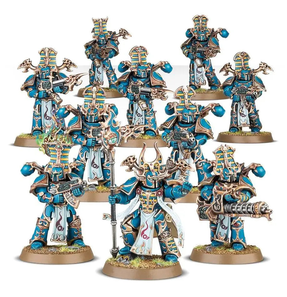 Warhammer Thousand Sons Rubric Marines squad of turquoise and gold armored miniatures with weapons