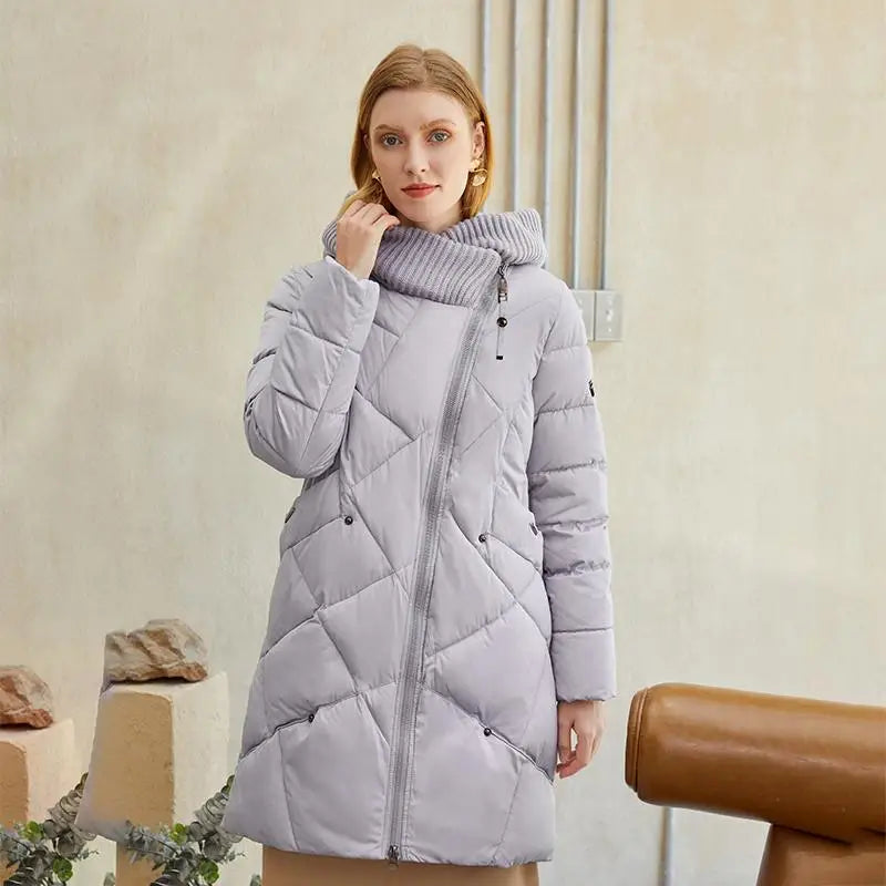 Warm elegant women coat with long puffer design, asymmetrical zipper, and ribbed collar