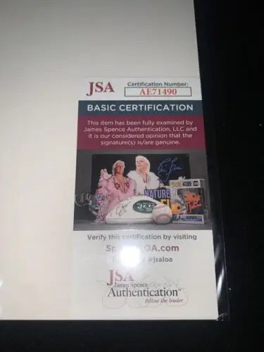 JSA authentication sticker on Warren Spahn signed sport magazine page from 1950