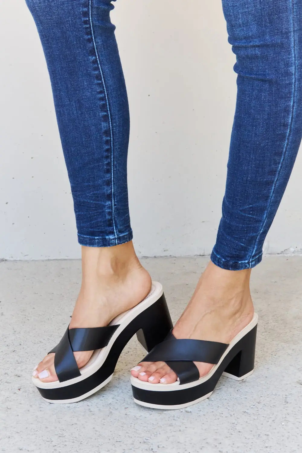 Black and white Weeboo Cherish platform sandals with chunky heel and comfortable heel height