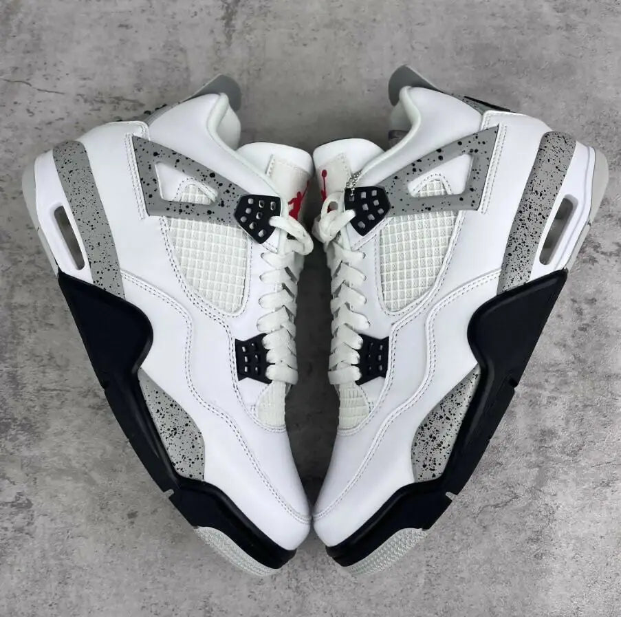 White Cement Air Jordan 4 Retro sneakers speckled in white, black, and grey with fast shipping