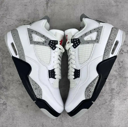 White Cement Air Jordan 4 Retro sneakers speckled in white, black, and grey with fast shipping