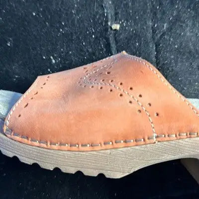 White Mountain orange leather slide sandals with decorative perforations and stitching