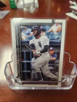 Baseball card in display stand featuring White Sox Luis Robert Jr. case hit fanatical