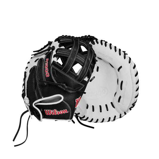 Black and white Wilson A1000 CM33 33” fastpitch softball catcher’s mitt for travel ball