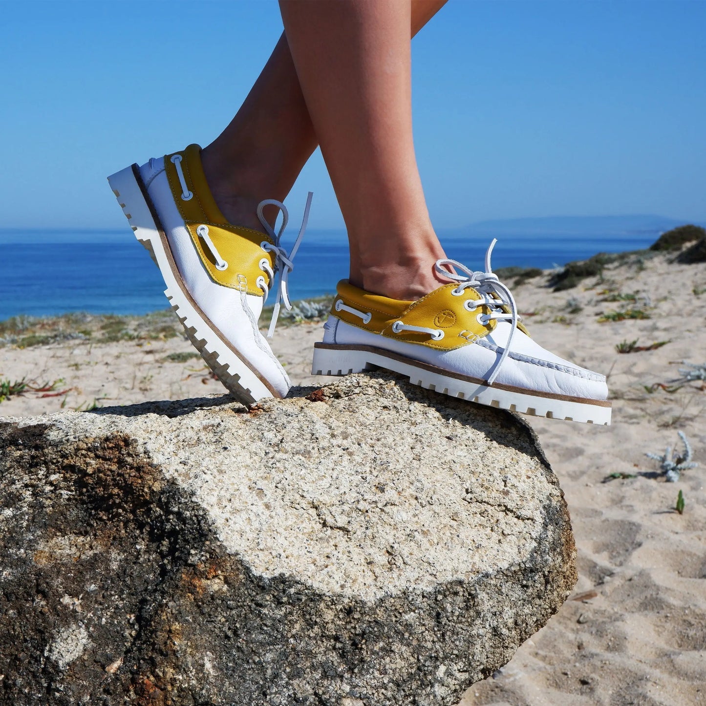 High quality women boat shoe Quirimbas in white and yellow leather with chunky soles