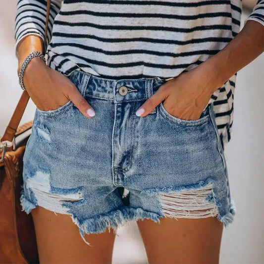 Women fringe denim jeans shorts featuring distressed denim and striped top for casual style
