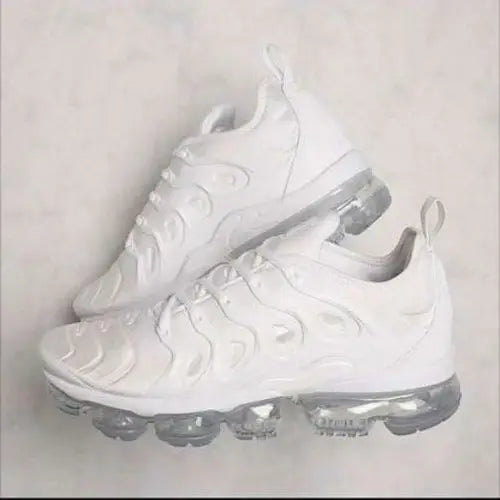 Women’s breathable white running shoes with translucent soles for comfortable workouts