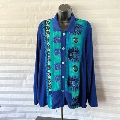 Blue and green floral and geometric patterned button-up blouse for women