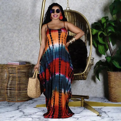 Woman in colorful tie-dye casual long dress with spaghetti straps, perfect for fashion casual long style