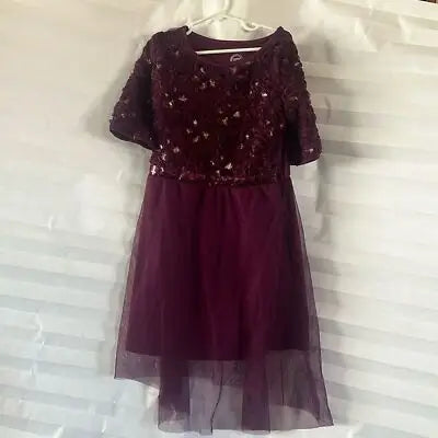 Royal purple girl’s tulle dress with sequined bodice and layered sheer skirt