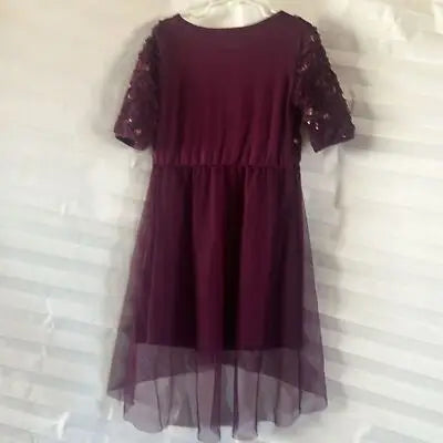 Royal purple girl’s tulle dress with sequined short sleeves and sheer overlay skirt
