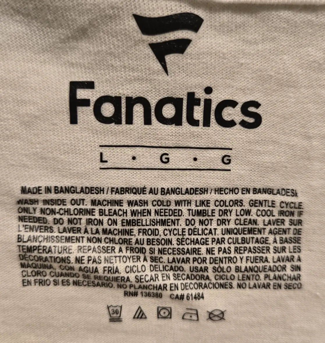 Clothing tag with care instructions on WWE SummerSlam Cleveland Fanatics T‑Shirt Men’s XL