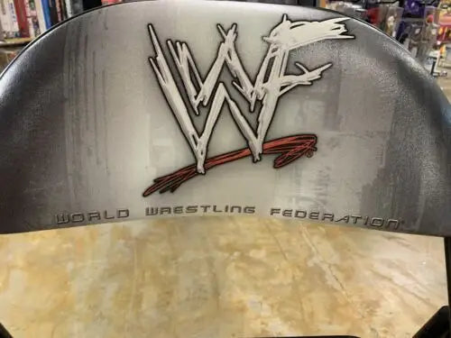 WWF logo on a VIP event chair from WWE Survivor Series Ringside VIP Event