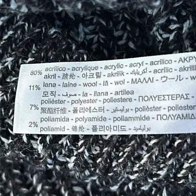 Fabric composition label on Zara Women’s Black & White Knitted 3/4 Sleeve Dress size small