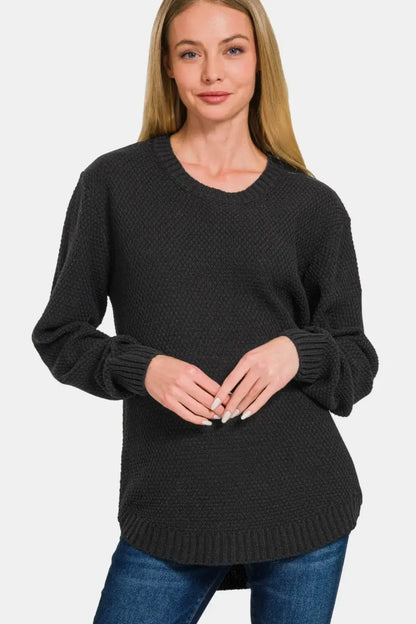 Black textured sweater with curved hem and round neck long sleeve design