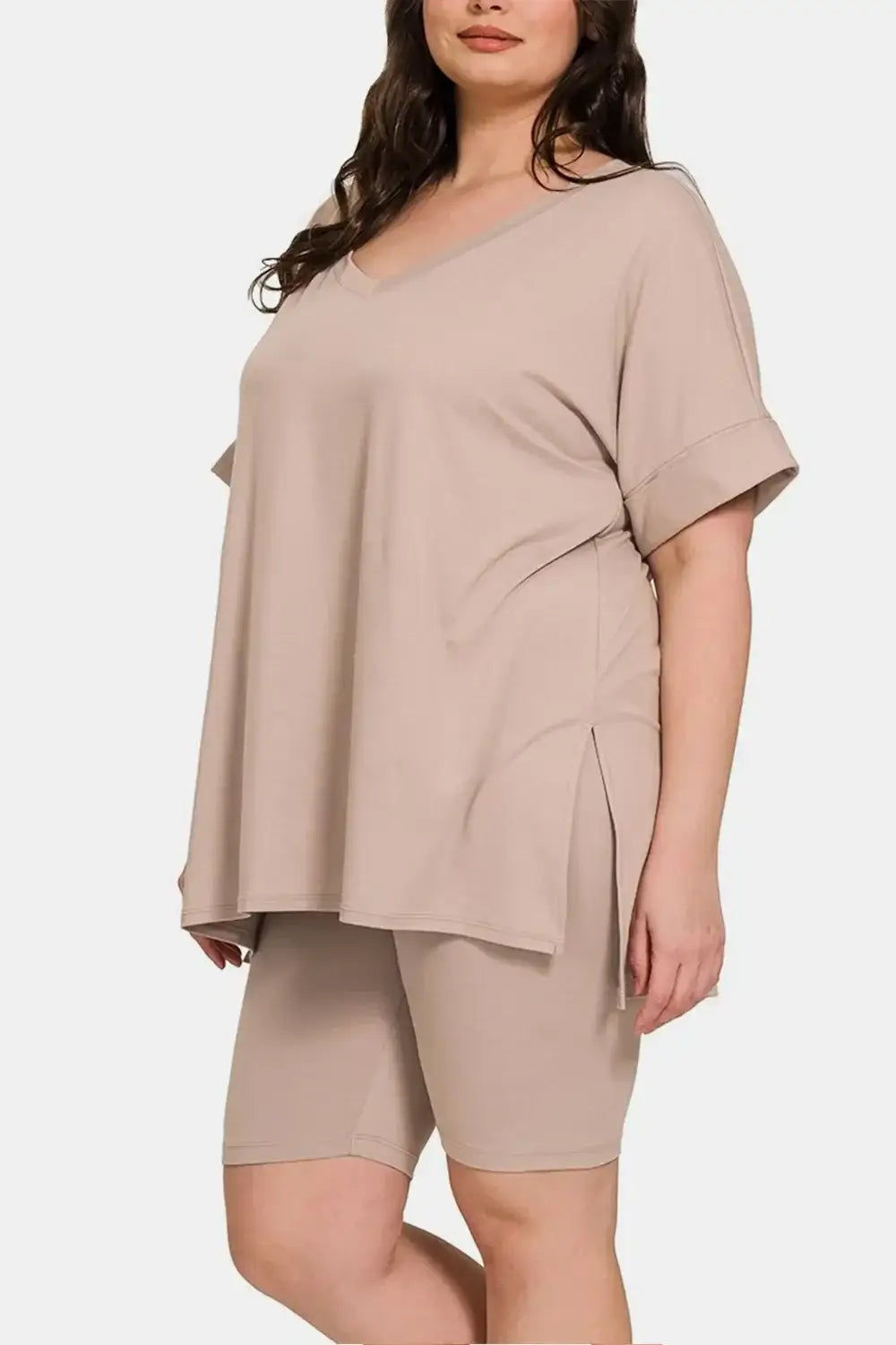 Beige plus-size peplum top with shorts set featuring short sleeve slit design and soft fabric