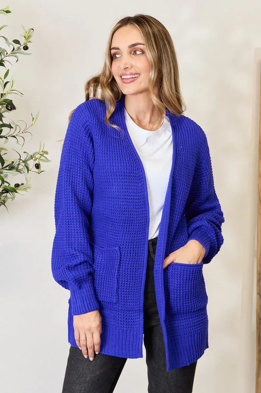 Woman modeling Zenana Full Size Waffle-Knit Open Front Cardigan with relaxed fit over white shirt and dark jeans
