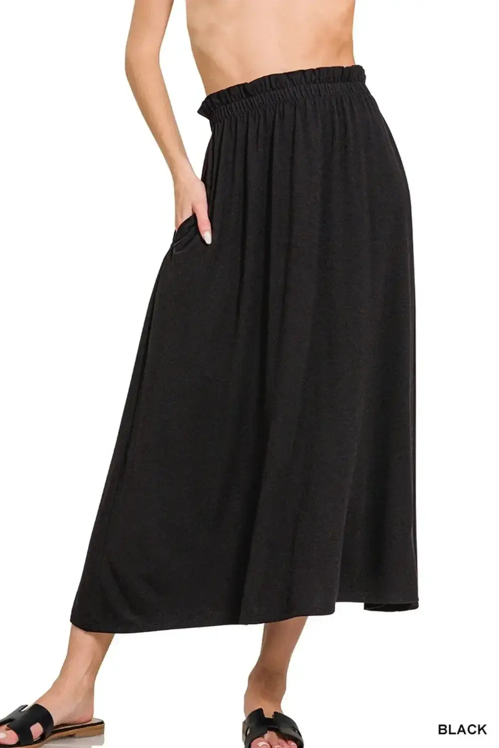Black cotton paperbag waist midi skirt with pockets and elastic waist for casual style