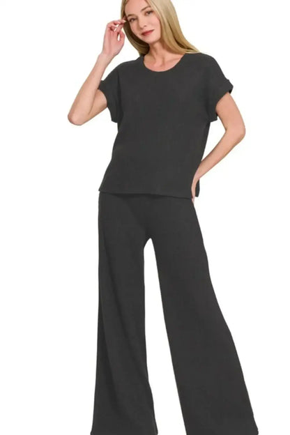 Black wide-leg pants with relaxed fit, soft material from Zenana rolled sleeve pants sweater set
