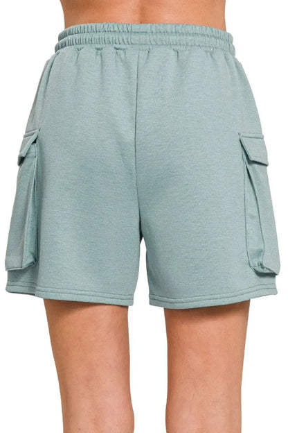 Green Zenana Scuba Thigh Pocket Shorts with multiple pockets and elastic waistband