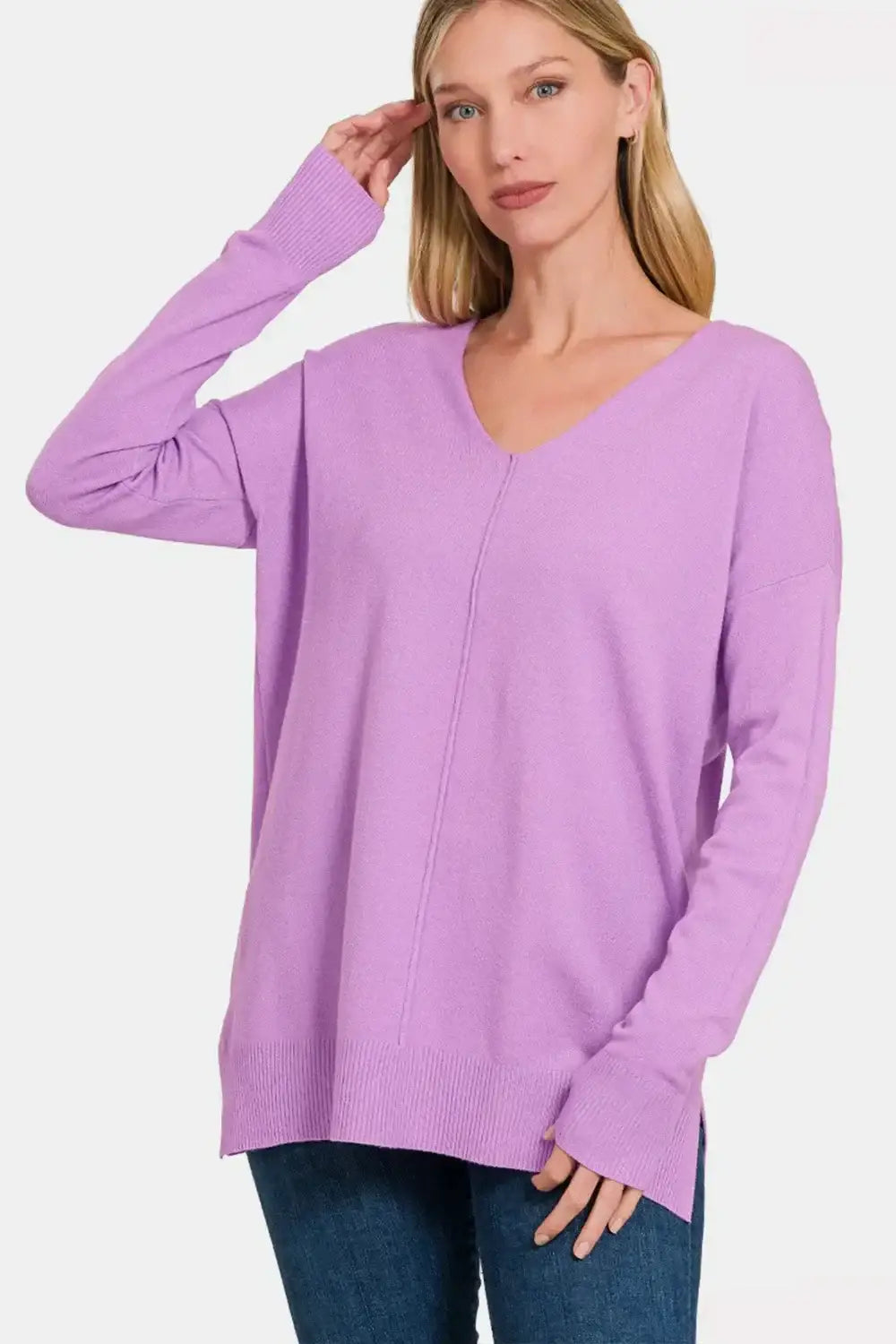Lavender dropped shoulder sweater with V-neck, long sleeves, and ribbed cuffs