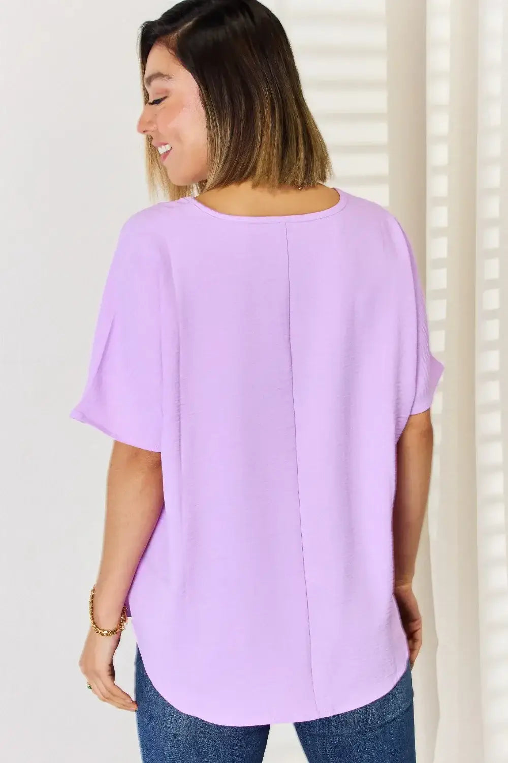 Lavender chiffon blouse with short sleeves and round neckline from Zenana Texture Short Sleeve collection