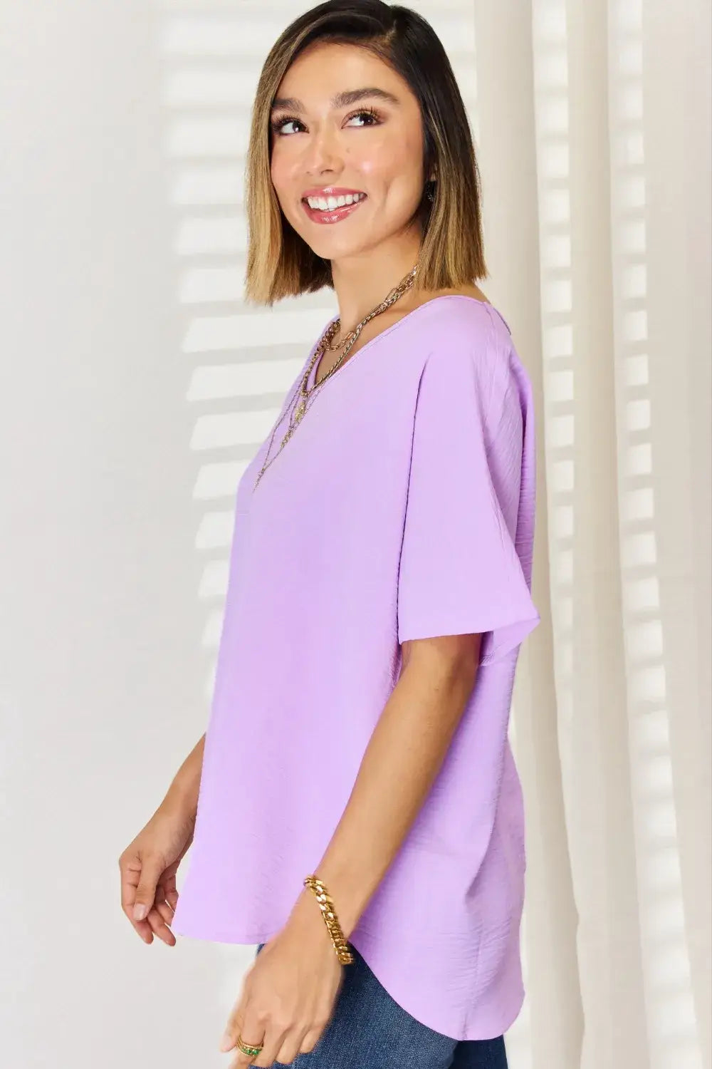 Lavender V-neck blouse with short sleeves and loose fit from Zenana Texture Short Sleeve T-Shirt collection